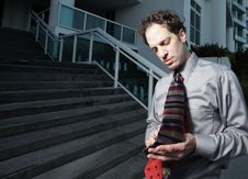 Man Playing With His Tie Royalty Free Stock Image