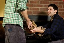 Man Giving Log To His Friend Stock Images Man Giving Log To His Friend Stock Images