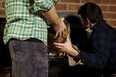 Man Giving His Friend A Log Royalty Free Stock Photo Man Giving His Friend A Log Royalty Free Stock Photo