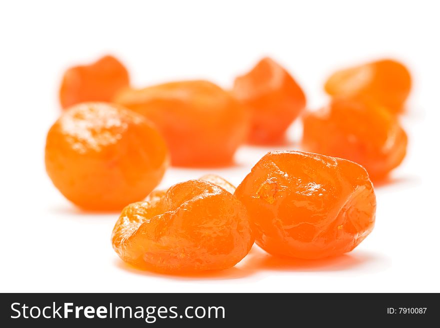 Dried kumquat isolated on a white background. Backround blurry.