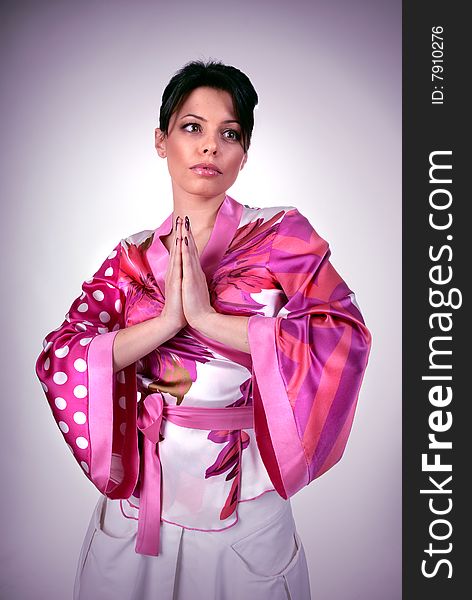 Atrractive girl in kimono pray. Atrractive girl in kimono pray