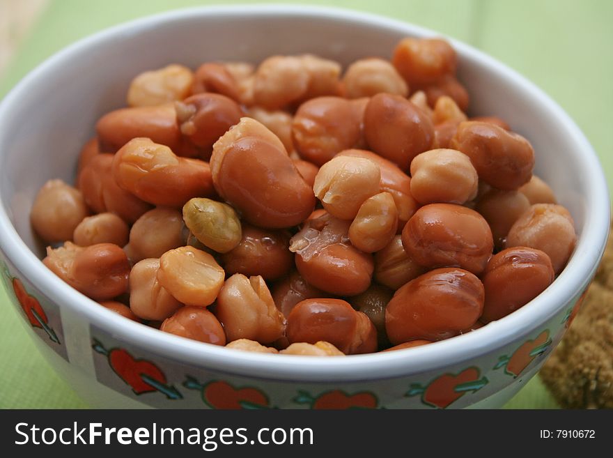 Some beans and chick peas in a bowl. Some beans and chick peas in a bowl