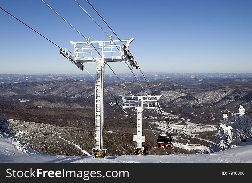 Line of Gondolas in a ski resort in Vermont.