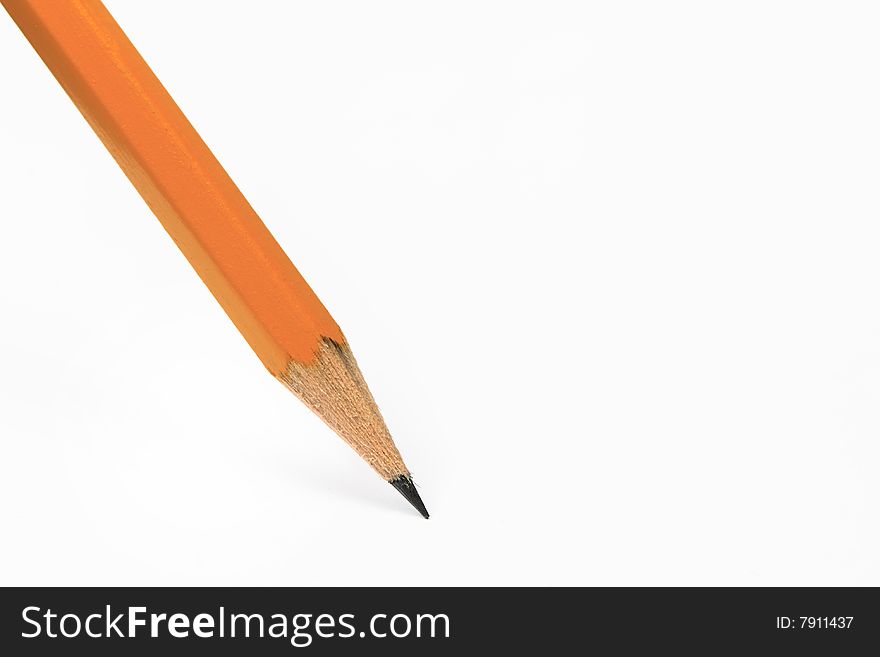 Close-up of isolated pencil standing on white background. Close-up of isolated pencil standing on white background