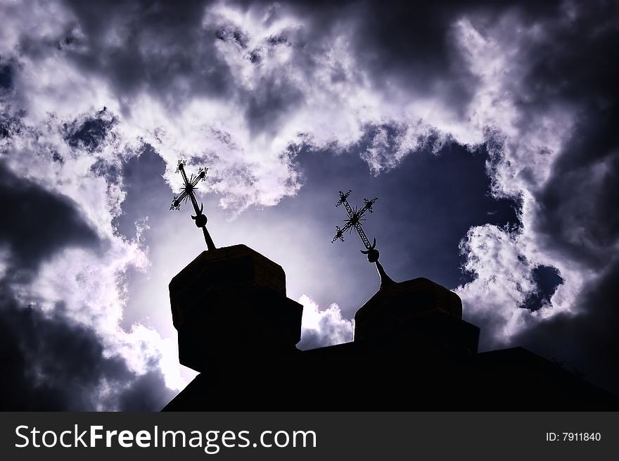 Silhouette Of Church With Crosses