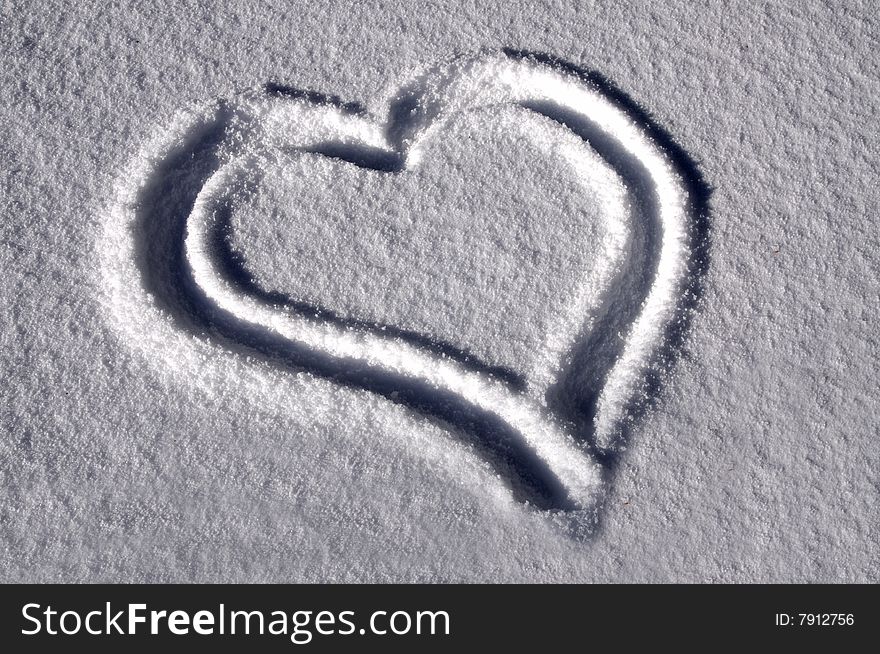 Heart drawn in the snow. Heart drawn in the snow