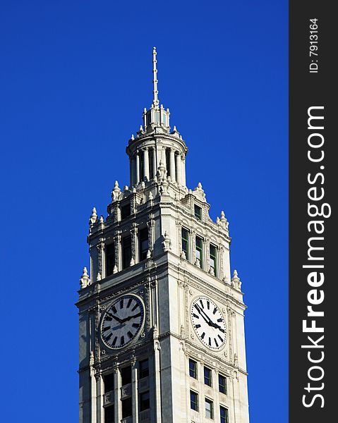 Two clocks are on the beautiful Wrigley building in downtown Chicago. Two clocks are on the beautiful Wrigley building in downtown Chicago.