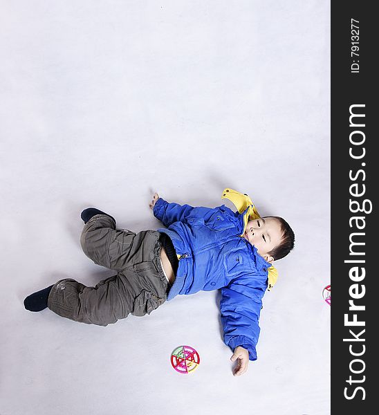 Boy Lying On Floor