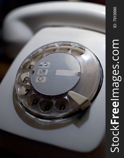 Old vintage white phone closeup
