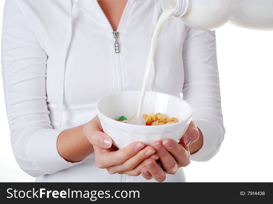 Portrait of young woman with plate of muesli and milk. Portrait of young woman with plate of muesli and milk
