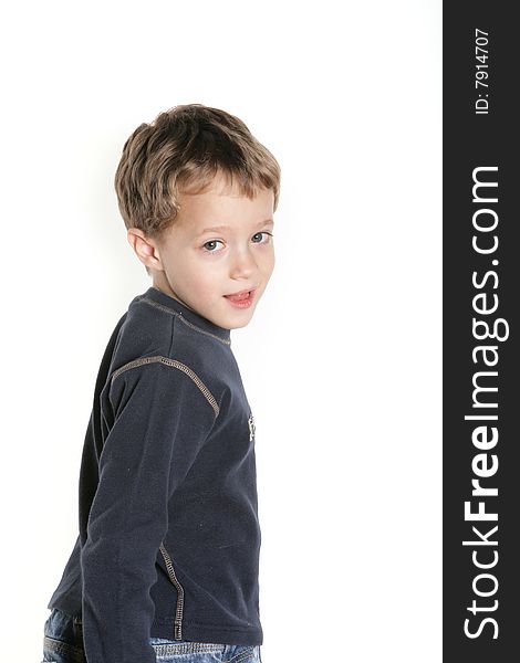 Cute four year old boy on white background