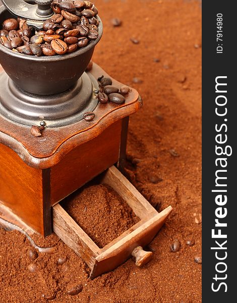 Detail of coffee grinder with coffee bean