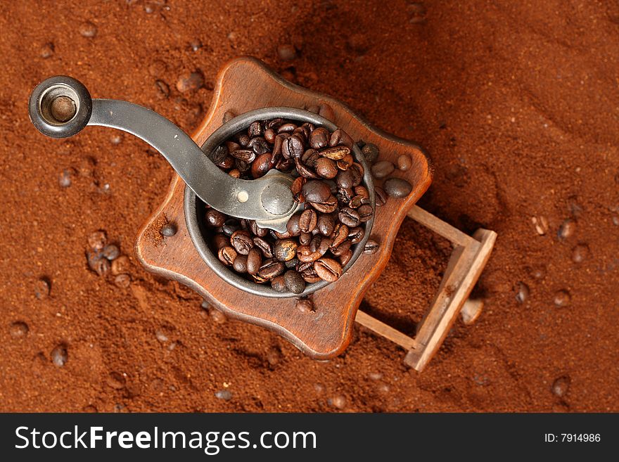 Detail of coffee grinder with coffee bean