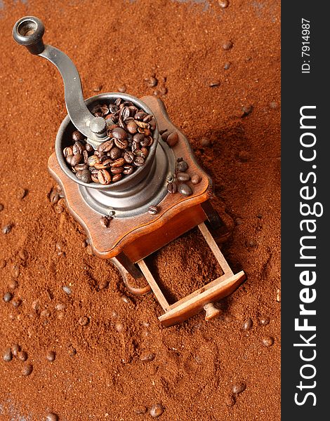 Detail of coffee grinder with coffee bean