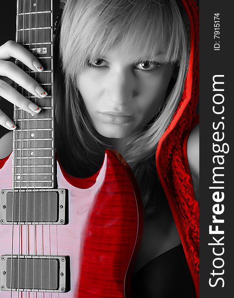 Woman with electric guitar