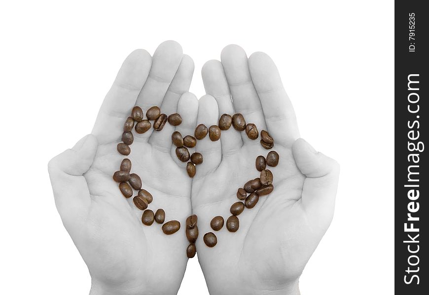 Coffee in black -white hands. Coffee beans  in form of heart. Isolated on white. Coffee in black -white hands. Coffee beans  in form of heart. Isolated on white.