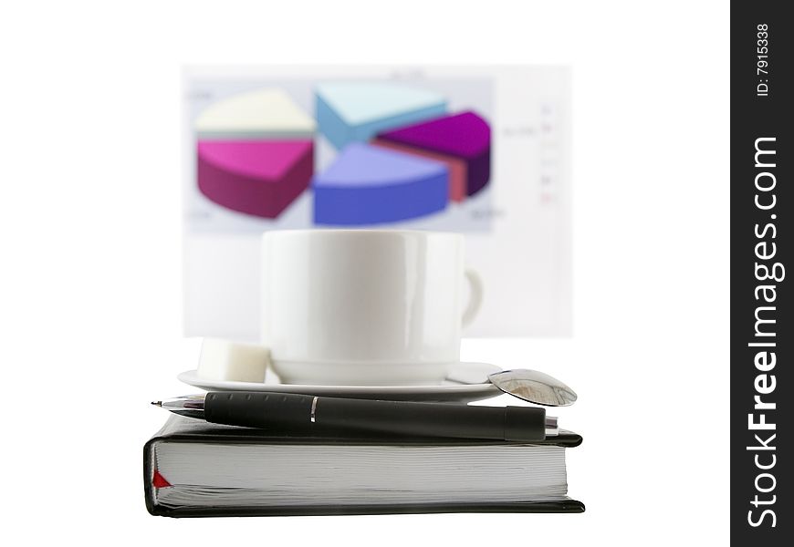 Coffee cup, standing on the black personal organizer, on a back background - financial  diagram . Focus at the pen. Isolated on white. Coffee cup, standing on the black personal organizer, on a back background - financial  diagram . Focus at the pen. Isolated on white.