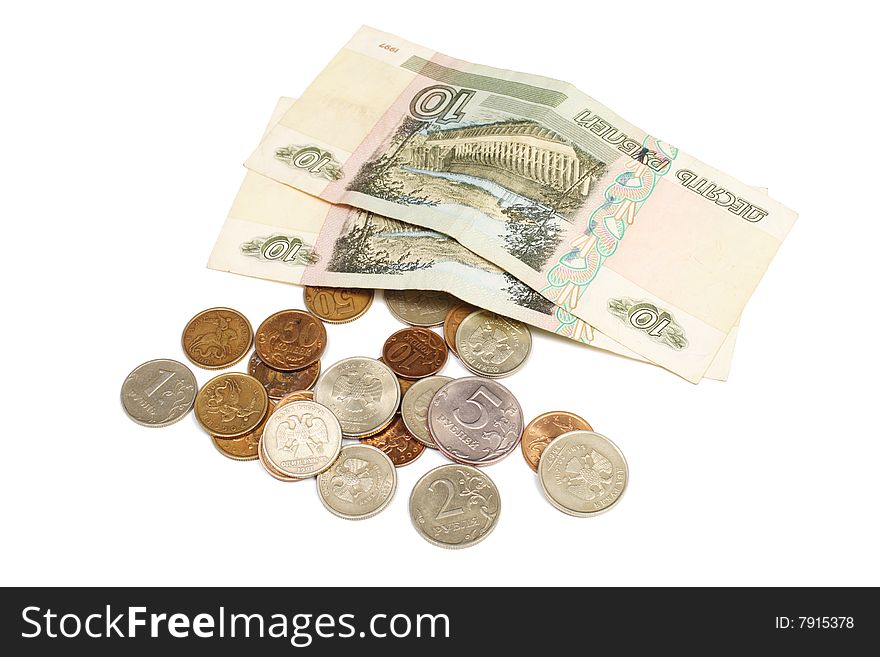 Paper money and coins are isolated on a white background