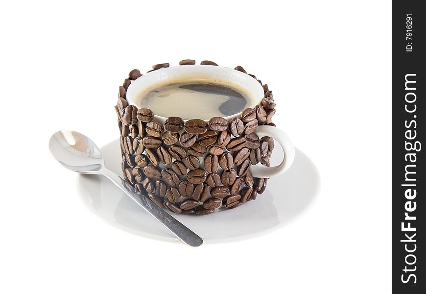 The cup of coffee,original decorated coffee beans.