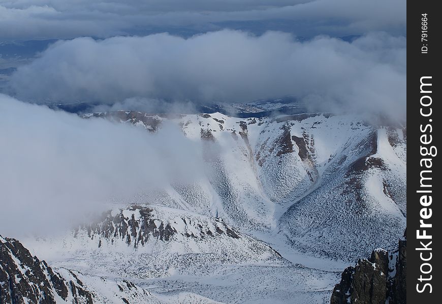 winter mountains covered with snow and fog. winter mountains covered with snow and fog