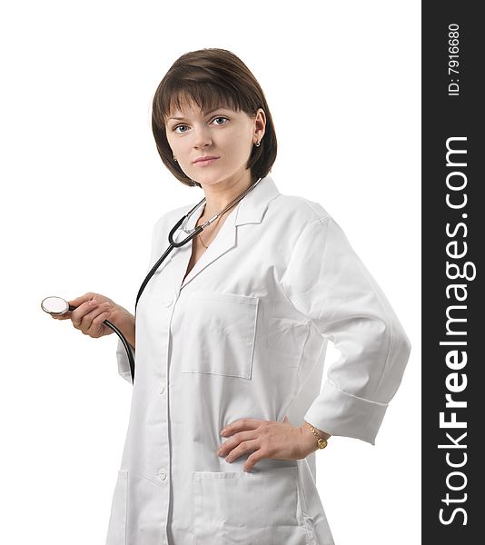 Young female nurse with stethoscope over white background
