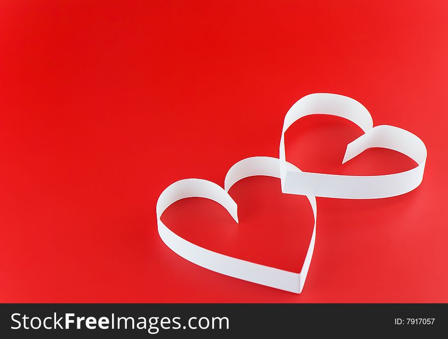 Two White Hearts,on Red Background.