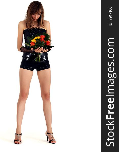 Sad woman in patent leather holding flowers. Sad woman in patent leather holding flowers