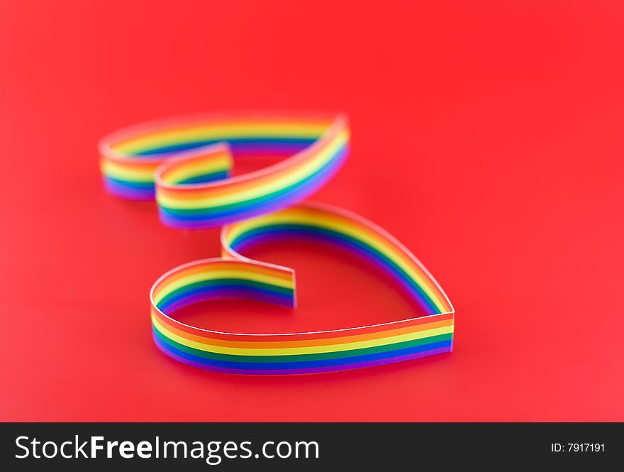 Two hearts, paint of a six-colour gay flag.Focus on front part first heart. Two hearts, paint of a six-colour gay flag.Focus on front part first heart.