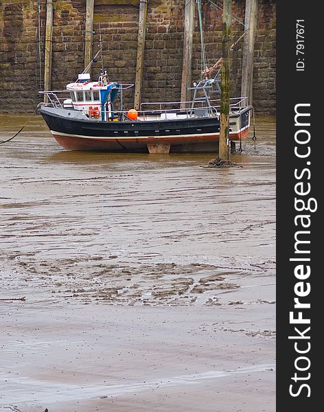 Fishing boat moored in harbor