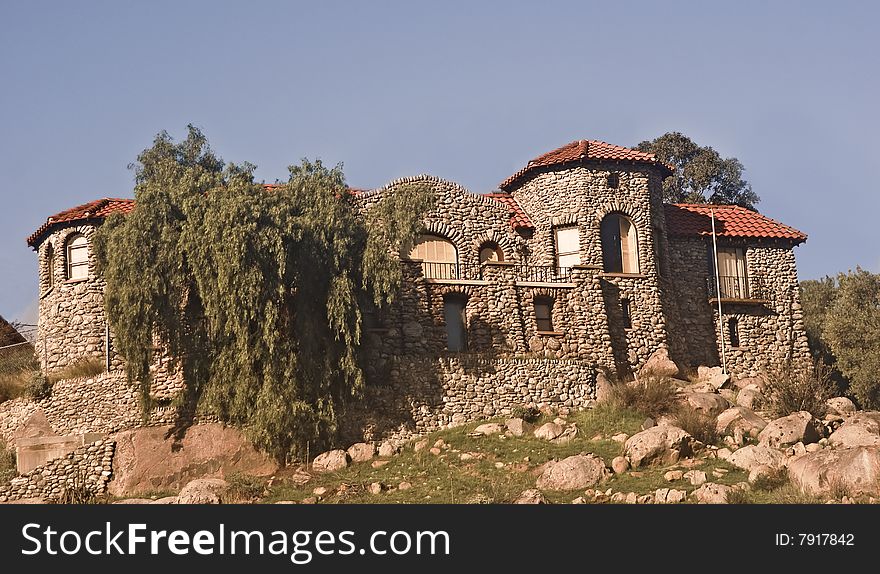 This is a picture of the landmark rock castle house at Perris, California.