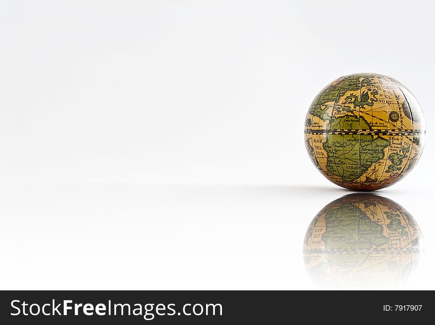 Earth on white background. reflex image. Earth on white background. reflex image