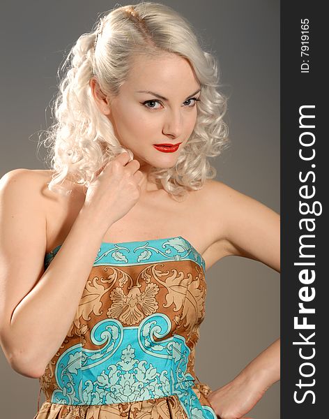 Pretty blond girl in authentic fifties dress. Pretty blond girl in authentic fifties dress