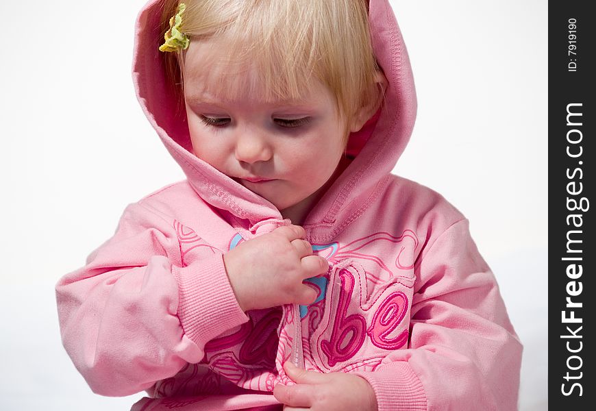 Beauty child in pink suit