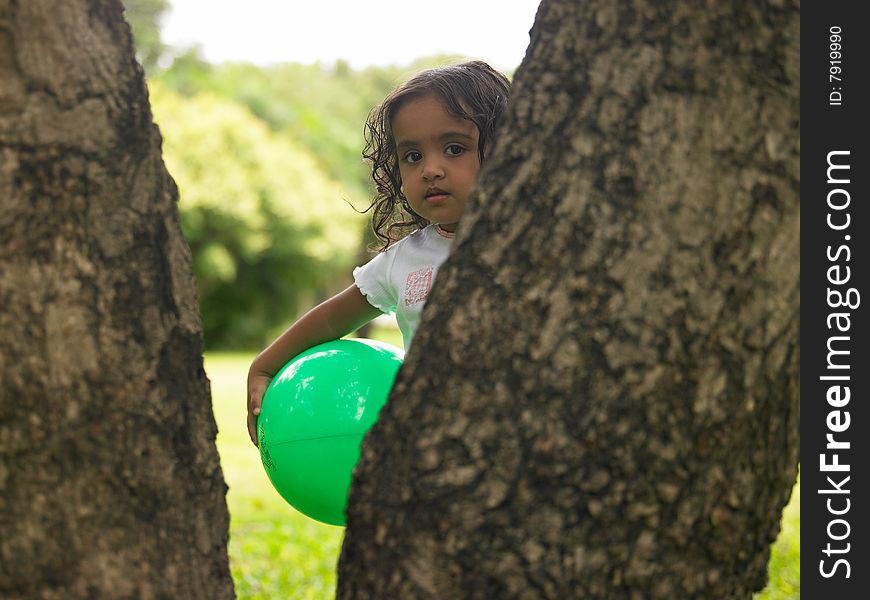 Asian Girl In A Park