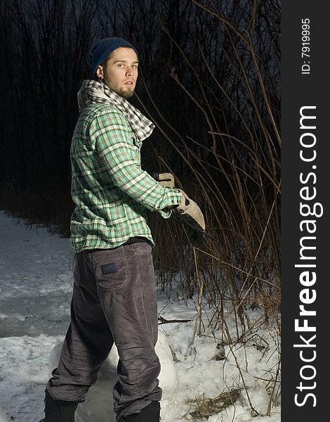 Young Man In Forest During Winter
