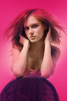 Beautiful Girl In The Wind (pink Background) Stock Photos