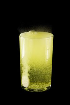 Glasse With Yellow Water Stock Photos