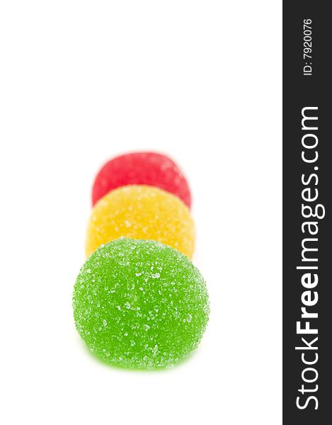 Sweet fruit color candy on white background