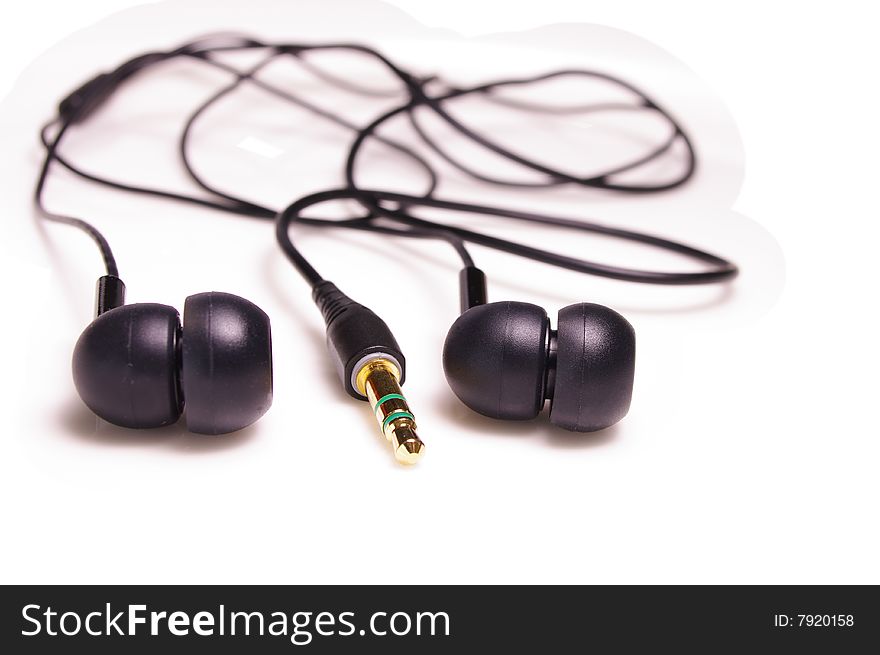 Black in-ear bud-style headphones. Black in-ear bud-style headphones