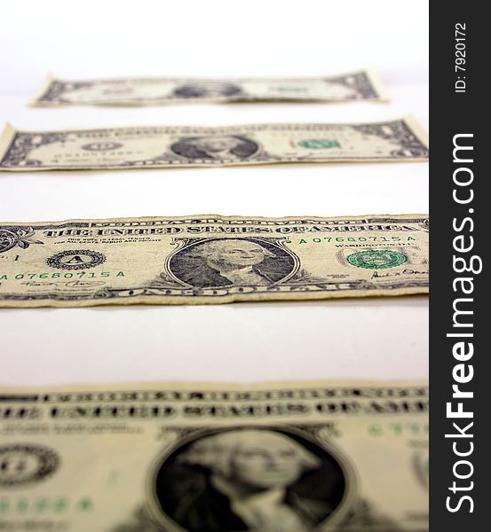 A selection of old, worn US dollar bills. A selection of old, worn US dollar bills