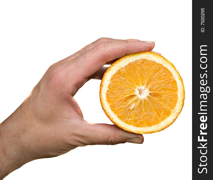 Hand holding half of orange