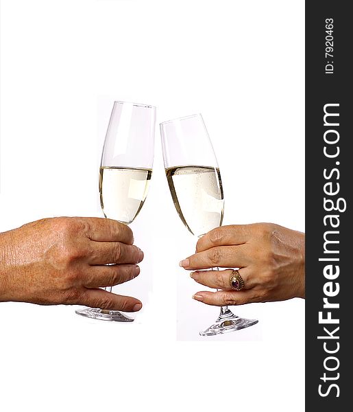A male and Female celebrating with a glass of champagne. A male and Female celebrating with a glass of champagne