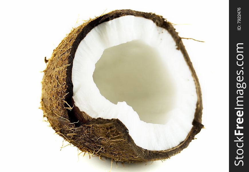 Coconut half isolated on white background