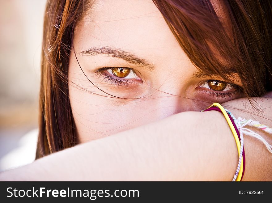 Young woman staring at camera. Young woman staring at camera.