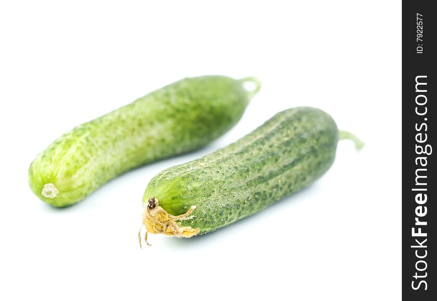 Green cucumbers isolated on white background