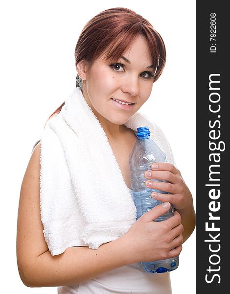 Attractive  thirsty woman with bottle of water