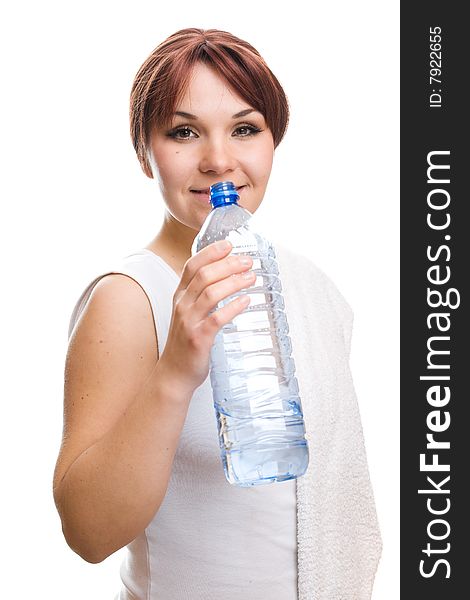 Attractive thirsty woman with bottle of water