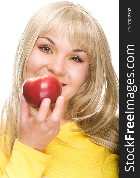 Attractive woman with apple. over white background. Attractive woman with apple. over white background