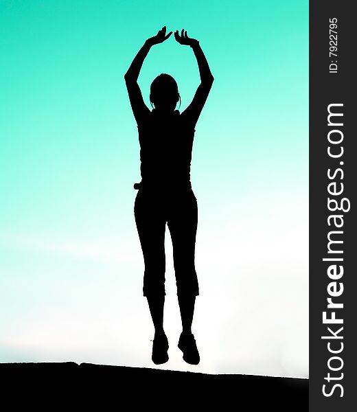 Silhouette of young sport woman or girl