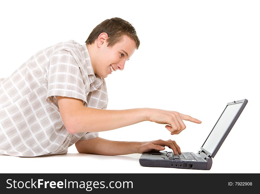Casual happy teenager with laptop.over white background. Casual happy teenager with laptop.over white background